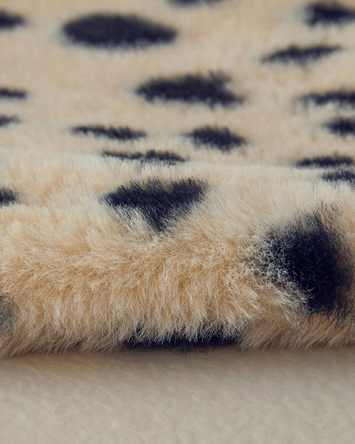 Spotty Hot Water Bottle Cream Black (view 3)