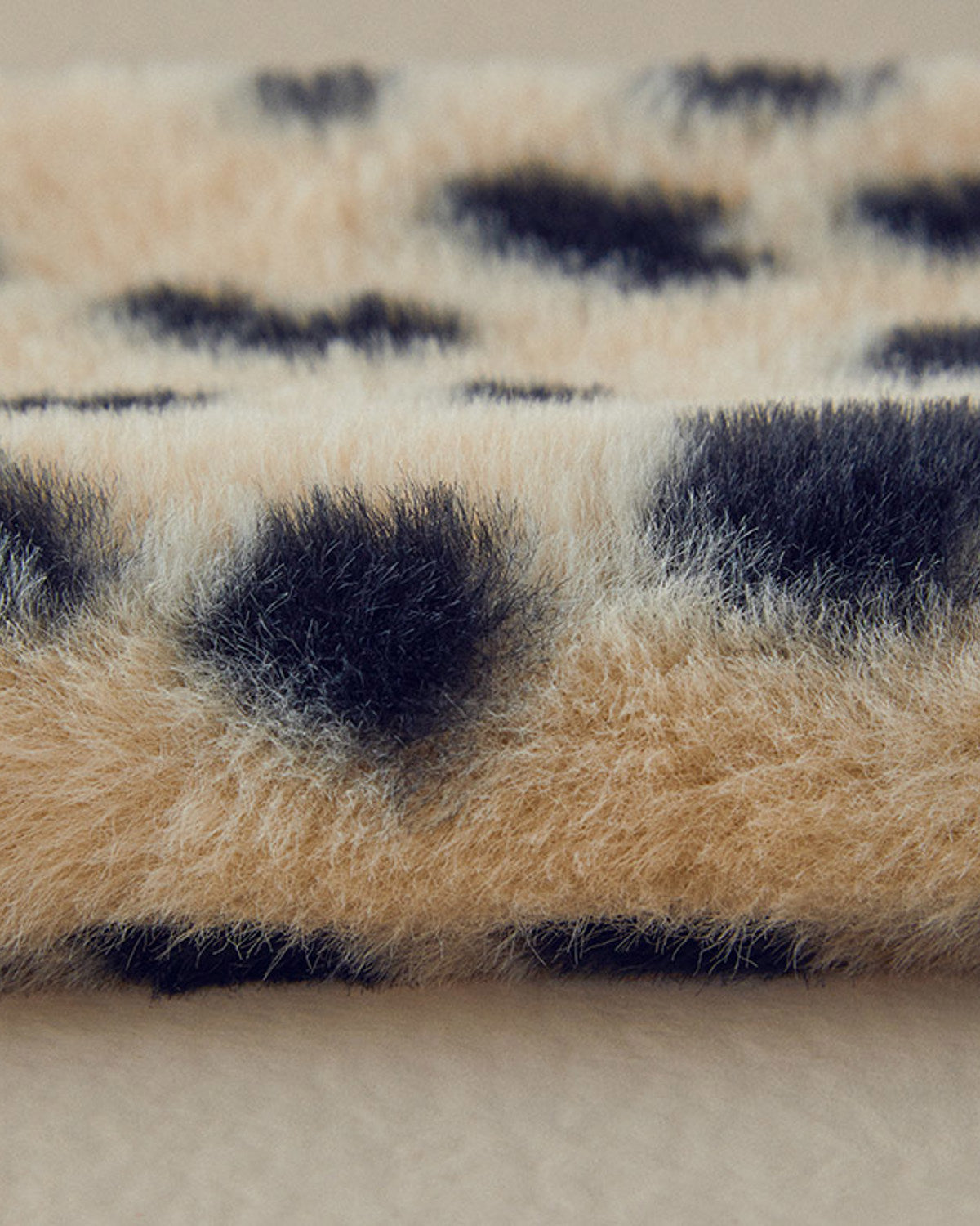 Spotty Hot Water Bottle Cream Black (view 7)